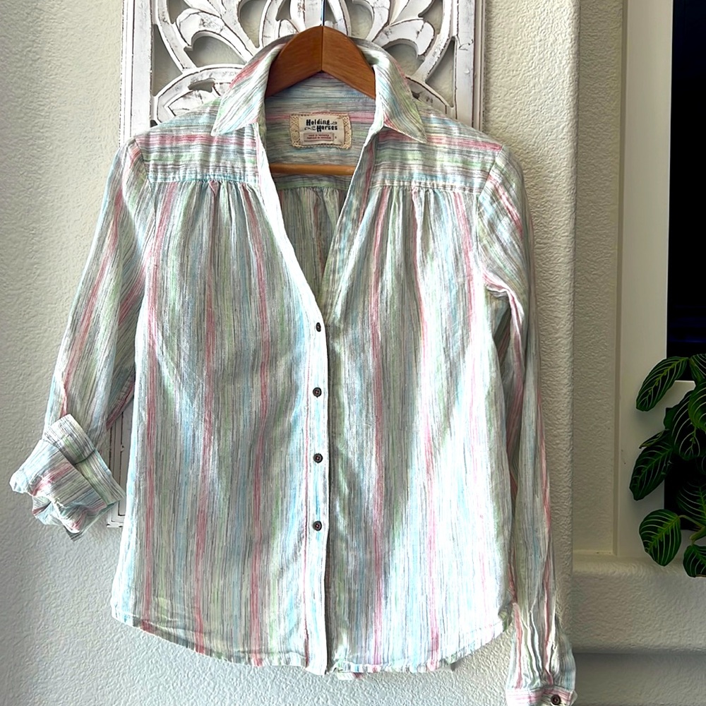100% cotton. Button up.